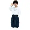 Pantalones de mezclilla de trabajo para niños, nuevo estilo coreano 2026, pantalones casuales holgados para niños para primavera y otoño, atuendo de otoño moderno para niños pequeños