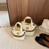 Bolso de mano para mujer estilo coreano transfronterizo 2026 principios de otoño nuevo popular versátil bandolera cruzada bolso cubo