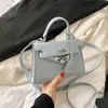 Bolso de Moda Transfronterizo para Mujer Bolso de Verano 2021 Nuevo Moderno Estilo Occidental Bolso Cruzado Patrón de Cocodrilo Bolso Kelly