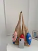 Bolso Bandolera de Diseño de Nicho Moda Femenina Bolso de Hombro Único Tejido de Pez Pequeño Versátil 2026 Nuevo Estilo Bolso de Mano para Viaje de Negocios Vacaciones