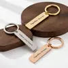 Llavero de acero inoxidable grabado más vendido transfronterizo, etiqueta larga con texto personalizado en inglés, colgante para llave de coche regalo
