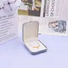 Caja de joyería flocked gris claro transfronteriza con hebilla dorada para anillos, aretes, colgantes y collares; caja organizadora de joyería