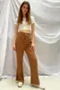 25 Calças Femininas de Veludo Quatro Estações Transfronteiriças Novas Roupas para Casa Calças Flare Femininas de Corte Justo Calças Casuais em estoque