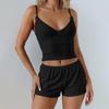 Europa y Estados Unidos mujeres calientes 2025 verano nueva moda camisola con cuello en V traje de shorts ajustado de color sólido al por mayor