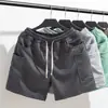Pantalones Casuales para Hombre de Moda Tendencia Marca Bolsillo Decorativo Juvenil Popular Holgados Cargo Pantalones Cortos de Verano de Moda