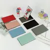Nuevo Espejo Pequeño de PU de Mano Regalo Espejo de Maquillaje Portátil en Stock Espejo de Maquillaje de Acero Inoxidable Espejo Plegable Irrompible