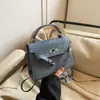 Textura de cuero PU, bolso pequeño de moda y versátil para mujer, nuevo y moderno bolso cruzado tipo Kelly para otoño e invierno 2026