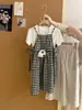 Conjunto de Tres Piezas para Niñas de Verano Nuevo Estilo Coreano Color Sólido Manga Corta Moda Cuadros Tirantes Vestido Pantalones Largos Casual Versátil Tendencia
