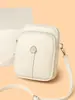 Elegante bolso pequeño cuadrado de piel suave para teléfono para mujer, nuevo modelo 2026, bolso de hombro cruzado versátil simple de nicho, monedero