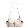 Nova bolsa de ombro estilo workwear retrô 2026 para mulheres, grande capacidade, múltiplos bolsos, couro macio, design de urso, bolsa transversal