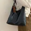 Nuevo Colgante Día de la Mujer Otoño Invierno Coreana Portátil Simple Bolso Tote 2026 Sensación Retro Gran Capacidad Hombro Único Moda
