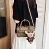 Otoño 2026 Nuevo Bolso Boston Simple de Alto Valor Estilo Coreano Moda de Nicho Elegante Bolso de Hombro Cruzado para Mujer