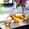 Venta al por mayor del fabricante Taza de té de vidrio transparente engrosada Juego de té Kung Fu Vidrio de borosilicato alto Taza de té transparente Mar de té Divisor de té