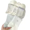 Calcetines blancos y azules con lazo para mujer, de longitud media hasta la pantorrilla, de moda estilo coreano para primavera y otoño, estilo deportivo universitario, adecuados para que las niñas los usen como calcetines de invierno