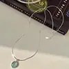 Colar de Pedra da Lua Água-Marinha Design de Nicho Feminino Pingente Oval de Alto Padrão Luxo Acessível Moda Corrente Ossinho de Cobra Nova Tendência