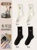 Calcetines grises con lazo para mujer, calcetines de media pantorrilla para primavera y otoño, calcetines apilados de encaje de ballet estilo Miu bordados de algodón puro para otoño