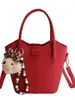 Bolso de Mano de Cuero Suave Estilo Coreano para Mujer 2026 Primavera Nuevo Bolso Cruzado de Cubo de Alta Gama para Viajes