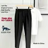 Pantalones profesionales para negocios, pantalones ajustados de moda estilo Hong Kong, ropa casual de hombre de alta gama sin planchado a la moda 2026