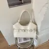 Bolso de mano casual de gran capacidad para mujer, nuevo y moderno de la primavera 2026, exquisito, de lujo ligero, para el hombro y cruzado diario