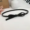 Cinturón fino de lazo para mujer, cinturón decorativo anudado versátil, negro de moda, adecuado para vestidos y suéteres para ceñir la cintura