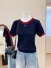 Suéter de punto de manga corta con cuello redondo y bloques de color estilo coreano para mujer, nuevo de verano 2026, casual, versátil, cómodo, camiseta básica