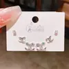 2026 Juego de Pendientes Personalizado en Forma de C Ojo de Serpiente Verde Circonita Seis Piezas con Acabado de Alta Gama, Aguja de Plata, Juego de Tres Pares de Pendientes de Lujo Ligero