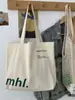 Bolsa de Tote Estilo Japonés Estilo Perezoso Ins Artístico Simple Gran Capacidad Estilo Coreano Bolso de Hombro de Lona para Mujeres Estudiantes Chic