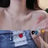 Estilo Idéntico de Bloggera Ins Coreana Fresco Corazón de Melocotón Pequeño Collar de Plata Personalizado con Cadena Corazón de Cristal Collar Colorido Moderno
