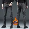 Jeans negros puros de alta gama Hong Kong 2026, elásticos, corte slim para hombre, pantalones casuales versátiles estilo coreano