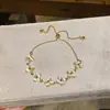 Pulsera Cruzada Europea y Americana de Zirconia Piedra Ojo de Gato Ovalada Simple con Diseño de Nicho, Accesorio de Mano Elegante y Versátil para Mujer