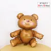 Nuevo Globo de Película de Aluminio de Oso Sentado Abrazando Pastel Estéreo 3D Oso Lámina de Aluminio Decoración de Cumpleaños Globo Diseño de Fiesta Venta al por Mayor