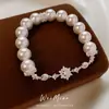 Pulsera de Perlas Redondas con Flor de Circonita, Gama Alta, Exquisita, Pulsera de Lujo Ligero, Estilo Palacio, Joyería de Mano Elegante al por Mayor
