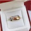 Tarjeta directa de fábrica más anillo de tres anillos chapado en anillo de tres anillos anillo tricolor anillo de pareja joyería de mano para mujer moda europea y americana