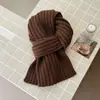 JM ofrece venta al por mayor de fábrica de bufandas de punto a rayas para mujer, perfectas para el invierno. Estas bufandas de estilo coreano son versátiles, están hechas de una mezcla de lana coreana y son gruesas para mayor calidez.