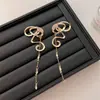 Diseño de nicho aretes de borla con lazo de cinta largos elegantes personalizados versátiles modernos