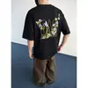 Camiseta Masculina Retro Americana Ins Floral de Manga Curta, Marca Tendência, Letras Graffiti, Manga Meia-Manga, Top Oversized e Caimento Solto