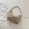Elegante y moderna colección de otoño 2026: una bolsa de mano única de gran capacidad para el trayecto diario, con diseño de lunares y correa para el hombro/cruzada