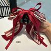 Nueva personalidad ins cebra lazo alto sentido de pequeño estilo clip cola de caballo belleza cabeza camelia accesorios para el cabello al por mayor