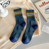 Calcetines de hombre otoño e invierno suela forrada de felpa media pantorrilla calcetines de hombre de moda cintura atada Calcetines deportivos para hombre invierno engrosados cálidos