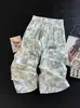 Elegantes pantalones de pierna ancha para madres, versátil estilo de verano fino para mujer, nuevos pantalones rectos casuales estampados populares 2026