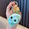 Llavero de Cámara de Proyección de Muñeca de Dibujos Animados Luminoso Proyector Artificial Llavero Colgante para Bolso Regalo Pequeño