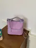 Bolso de Mano Trenzado de Moda Transfronterizo de Nicho Tipo Cubo para Mujer 2026 Nuevo Versátil Cadena Exterior Hombro Cruzado