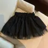 Foto real de ropa de mujer de Dongdaemun, Corea: falda corta de verano de alta calidad de cintura alta con ribete de encaje