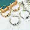 Moda Europea y Americana Estilo Caliente Pendientes Simples en Forma de C Chapados en Oro Pendientes de Perla de Imitación Venta al por Mayor Pendientes Nuevos Transfronterizos