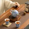 Tetera taza de té de cerámica de alta calidad azul plateado y oro blanco y plata belleza equivocada para el hogar una olla dos tazas juego de té kung fu caja de regalo