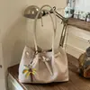 Bolso tote de correa cruzada con sensación holgada para mujer 2026 nuevo ligero de lujo nicho alta gama gran capacidad de un solo hombro debajo del brazo