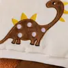Conjunto de franela para niños de comercio exterior transfronterizo otoño e invierno, con un diseño de bordado de dinosaurio de dibujos animados, que consta de una sudadera de manga larga y pantalones largos, un conjunto de dos piezas para niños