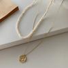 Collar con moneda de oro en relieve de moda europea y americana, colgante con diseño de moneda de alto sentido, cadena de clavícula, joyería de moda con personalidad de nicho