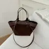 Bolso Vintage Estilo Coreano Nuevo 2026 Transfronterizo, Bolso de Lona con Diseño de Nicho de un Solo Hombro, Bolso Tote de Lona con Retazos de Gran Capacidad