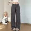 Pantalones de trabajo de algodón puro de moda para primavera y otoño, unisex, diseño casual americano, corte holgado, versátiles y con una silueta de pierna recta y fluida.